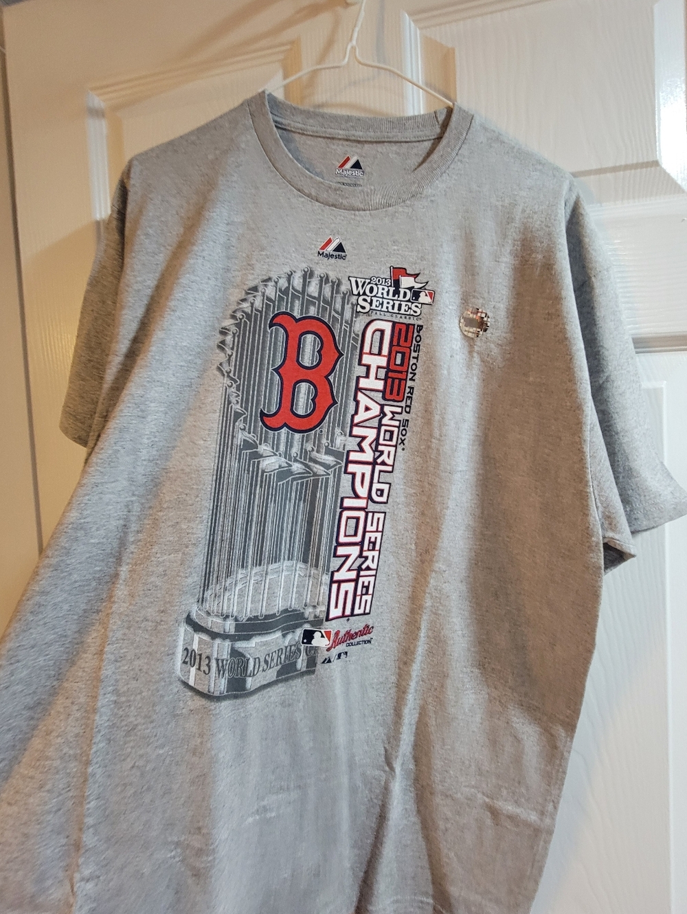 Gray Majestic Boston Red Sox t-shirt. Has the 2013 World Series Champion-size L